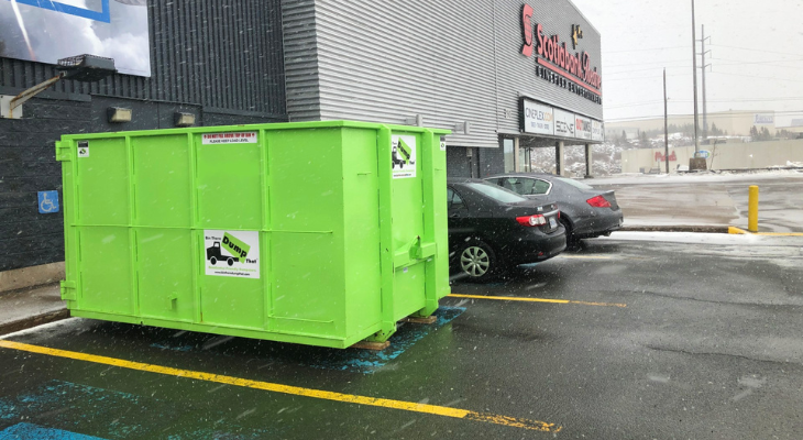Dumpster placed in parking spot